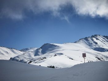 Snowcapped mountains against sky