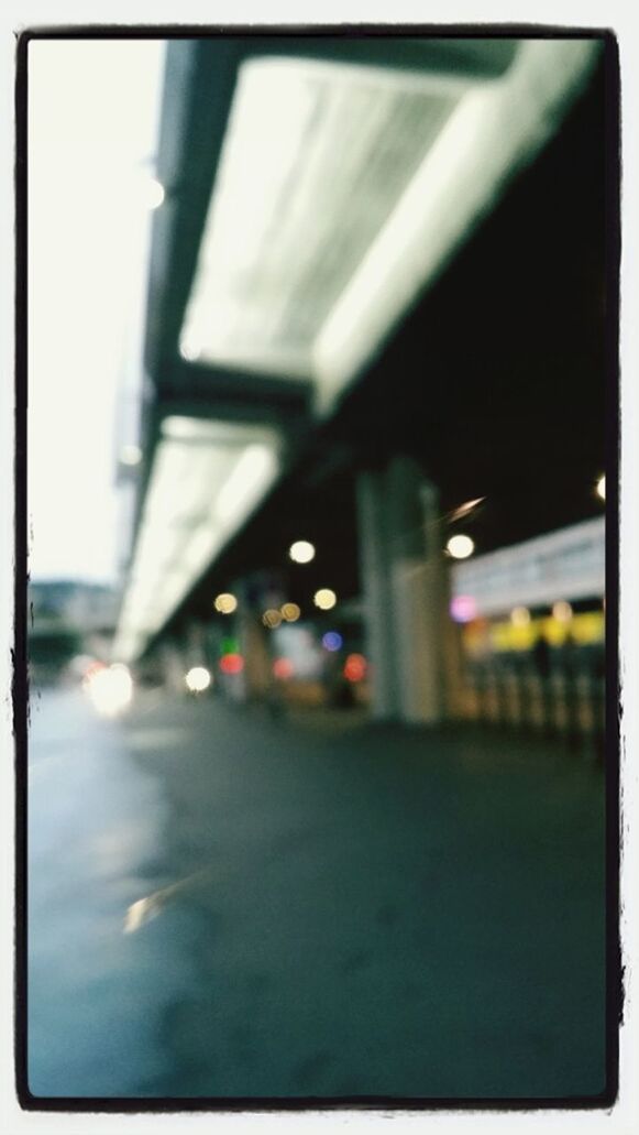 transfer print, illuminated, auto post production filter, night, architecture, built structure, lighting equipment, transportation, building exterior, city, indoors, street, road, selective focus, no people, street light, incidental people, light - natural phenomenon, car