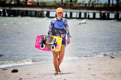 Full length of a man walking on beach