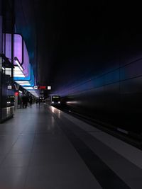 Train at railroad station at night