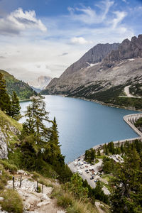 Scenic view of lake and mountains against sky