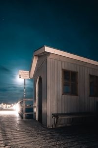 Building against blue sky at night