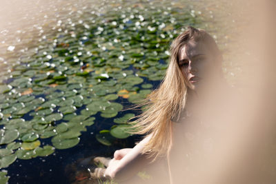 Young woman in water