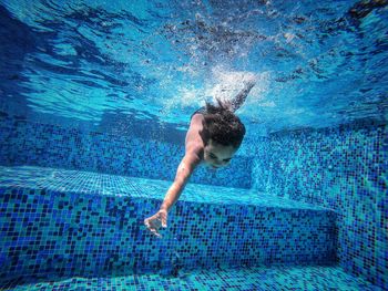 Girl swimming in pool