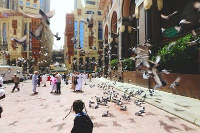 Woman standing in city