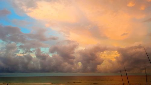 Scenic view of sea against sky at sunset