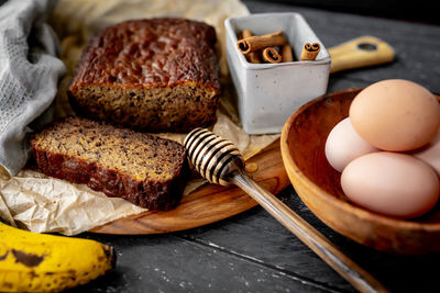 Home made banana bread rustic flat lay fresh ingredients honey eggs