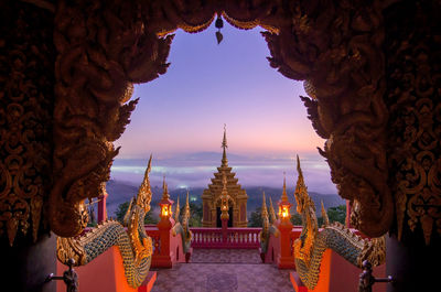 Low angle view of temple against sky during sunset