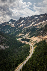 High angle view of road amidst mountains against sky