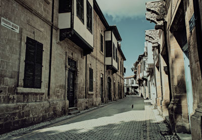 Narrow alley along buildings