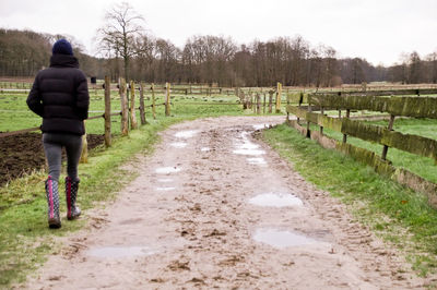 Full length of man on field against sky
