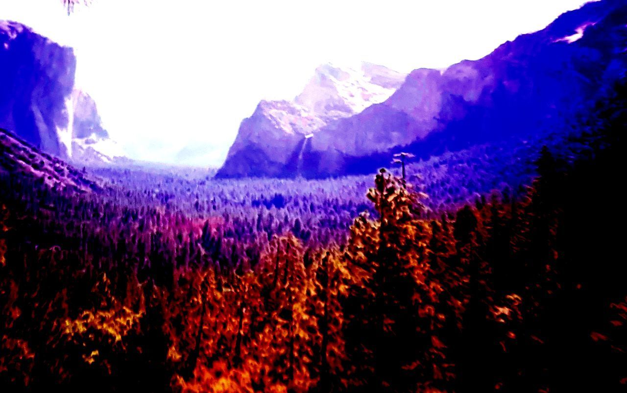 SCENIC VIEW OF MOUNTAINS AGAINST SKY DURING WINTER