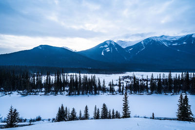 Scenic view of snowcapped mountains against sky