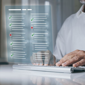 Midsection of man using laptop