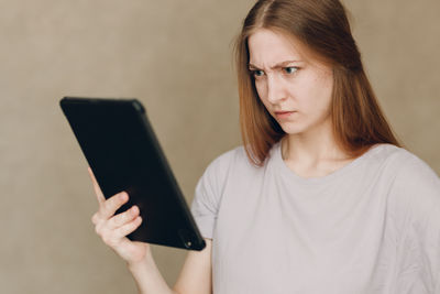 Young woman using laptop