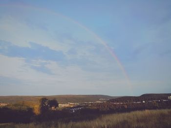 Scenic view of rainbow against sky