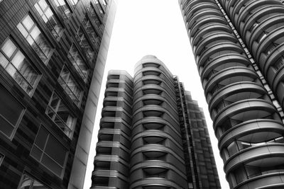 Low angle view of modern buildings against clear sky