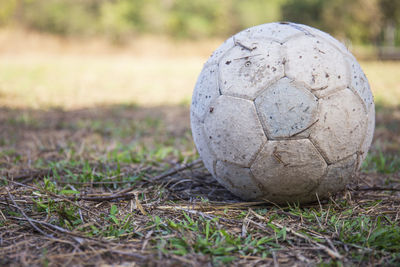 Close-up of soccer ball on grass