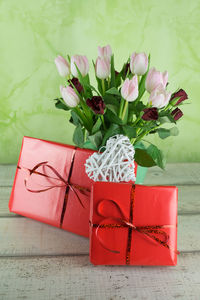 Close-up of pink flowers in vase on table