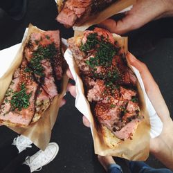 Cropped image of man eating food