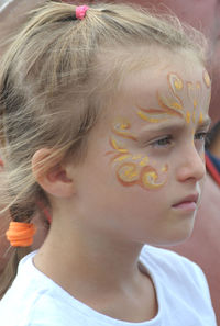 Close-up of girl with painted face