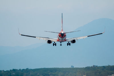 Low angle view of airplane landing