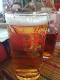 Close-up of beer glass on table