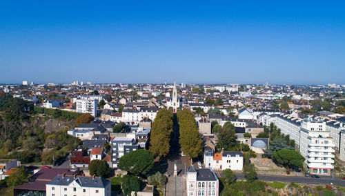 High angle view of town against clear sky