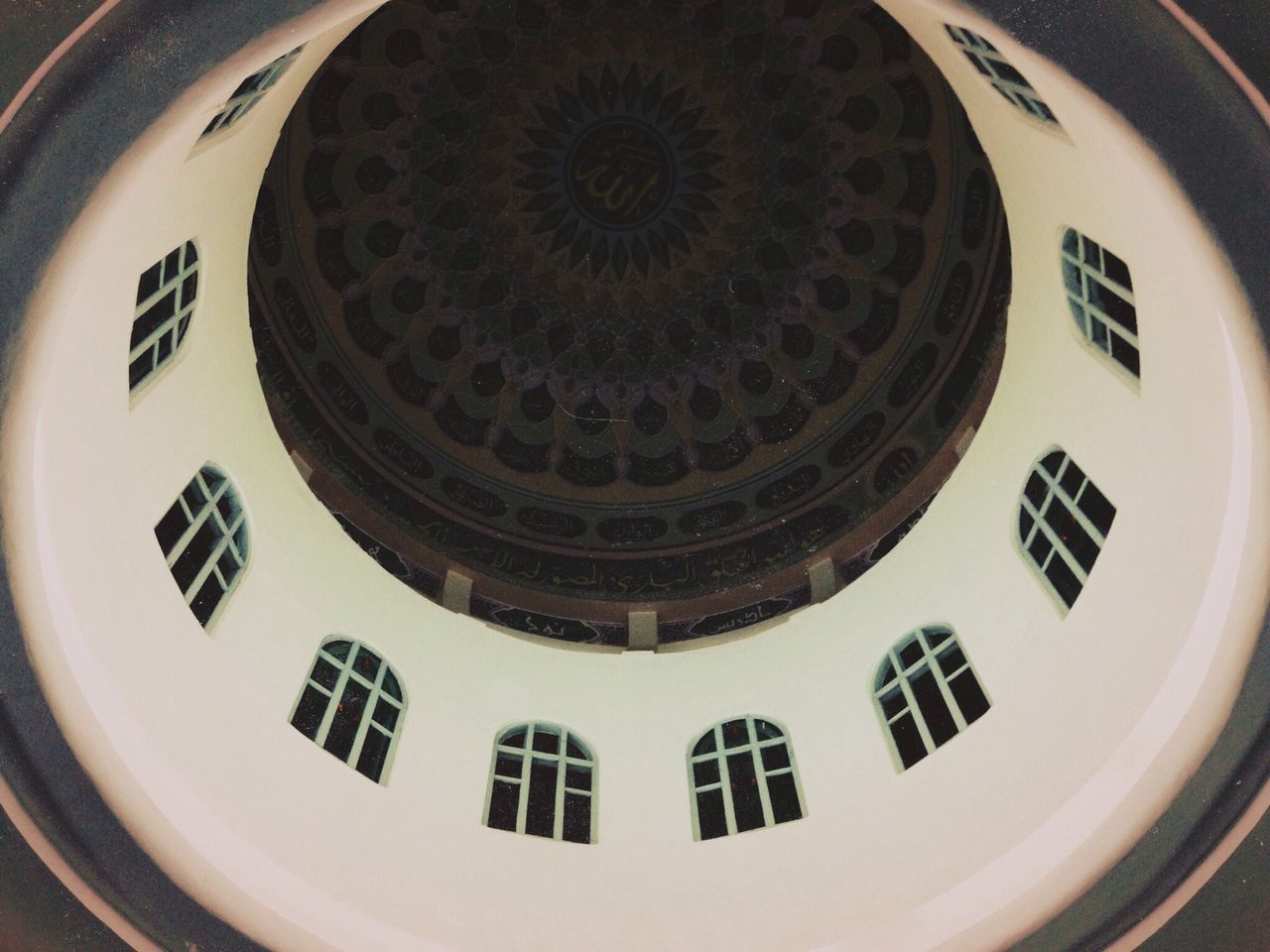 indoors, architecture, circle, built structure, low angle view, window, no people, close-up, clock, arch, time, geometric shape, day, pattern, design, building exterior, part of, ornate, history, architectural feature