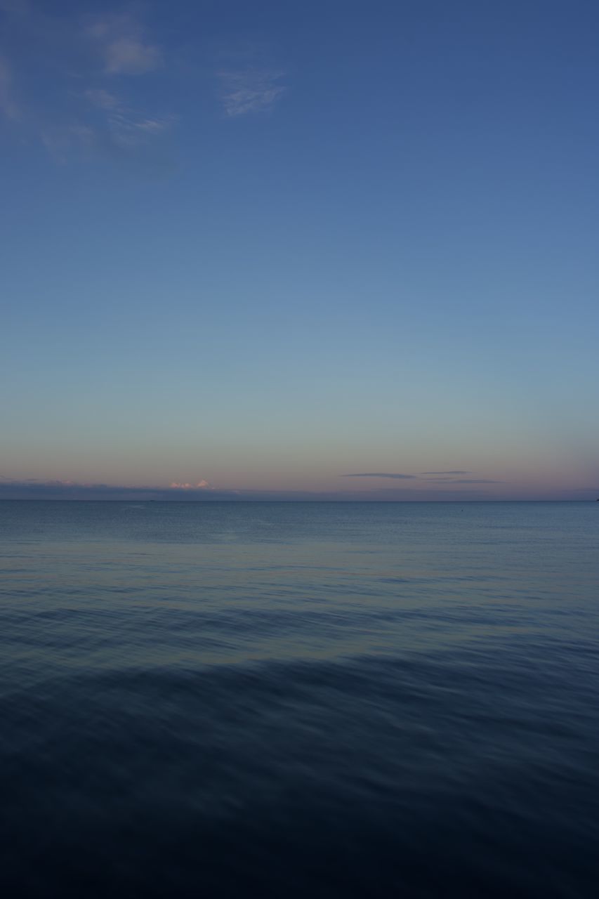 SCENIC VIEW OF SEA AGAINST BLUE SKY