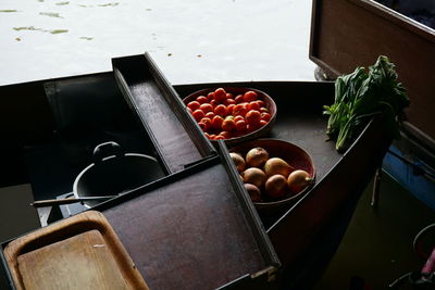 High angle view of fruits in container on table