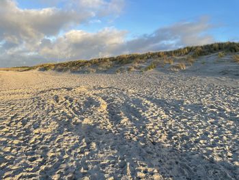 Scenic view of land against sky during winter