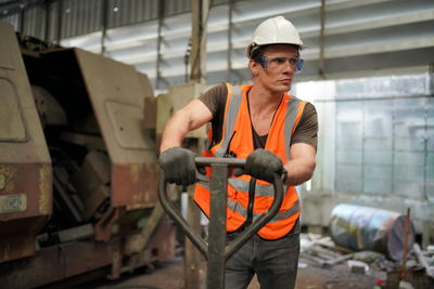 Side view of man working in gym