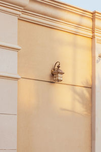 Low angle view of window on wall