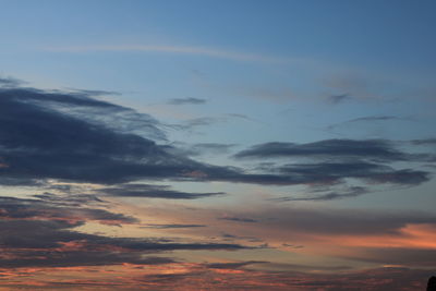 Low angle view of dramatic sky during sunset