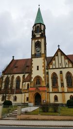 Low angle view of church against sky