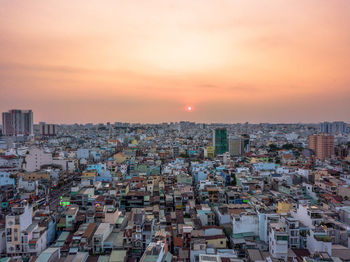 High angle view of townscape against sky during sunset