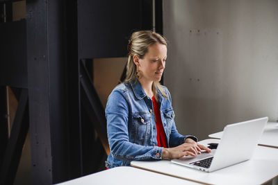 Woman working on laptop