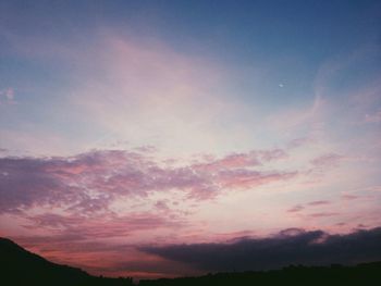 Scenic view of landscape against sky during sunset