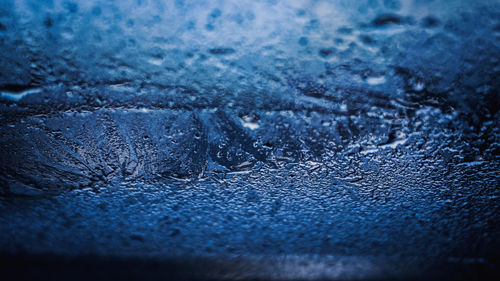 Close-up of wet blue during winter