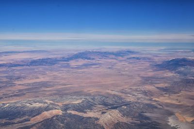 Aerial view of dramatic landscape against sky