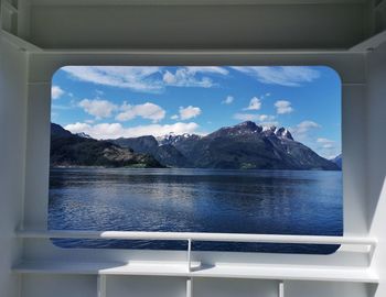 Scenic view of sea seen through window