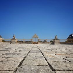 View of temple against clear blue sky