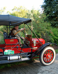 Man sitting in car