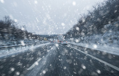 Cars on road during winter