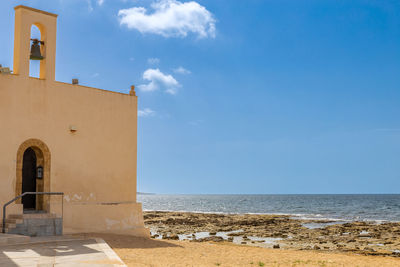 The beautiful trapani coast with an ancient building