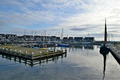 Boats moored at harbor