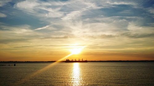 Scenic view of sea at sunset