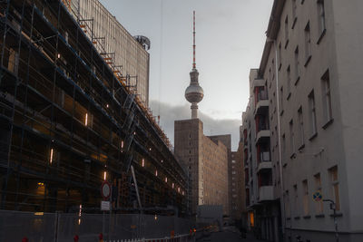 Buildings in city against sky