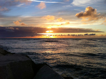 Scenic view of sea against sky during sunset